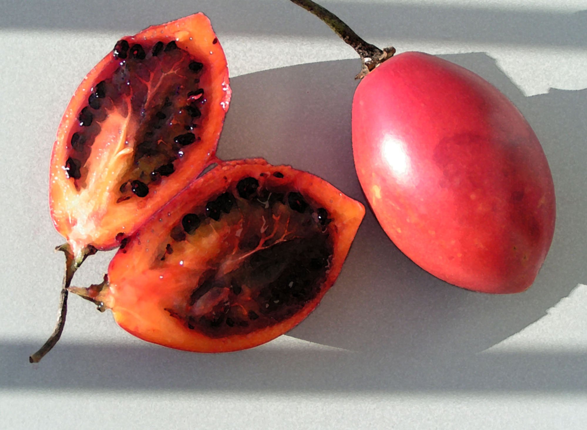Плоды бывают красные и желтые. Тамарилло фейхоа. Груша Тамарилло. Тамарилло фрукт. Тамарилло фрукт оранжевый.